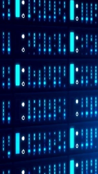 A close-up view of a server room with rows of servers, illuminated by blue and teal lights. The image represents the digital infrastructure and technology that underpins modern innovations, such as AI and data analytics, highlighting the importance of digital transformation in today’s business landscape.