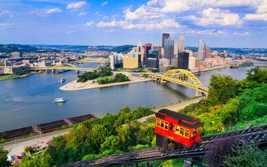 Pittsburgh, Pennsylvania, USA downtown skyline and incline over the Ohio River